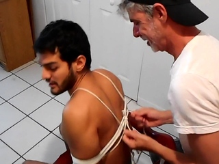 Sebastian Cums gets a blowjob while tied to a chair