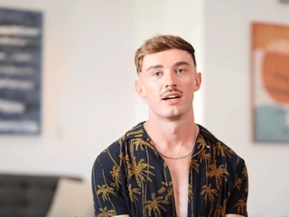 Tattooed jock strokes his soft dick while he masturbates