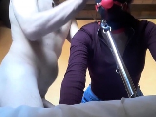 tied, blinfolded and ball gagged then has to suck a big cock